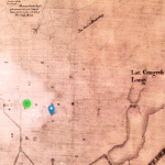 An aged map. Boundaries and streets are faintly outlined in black. A green circle and three blue pinpoints have been superimposed on the map.